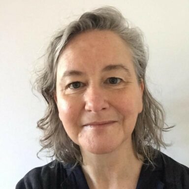 Picture of Karen Wylie with shoulder length hair and a black top