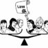 Scroll with 'law' written on it above scales of justice, balanced by diverse people on either side.